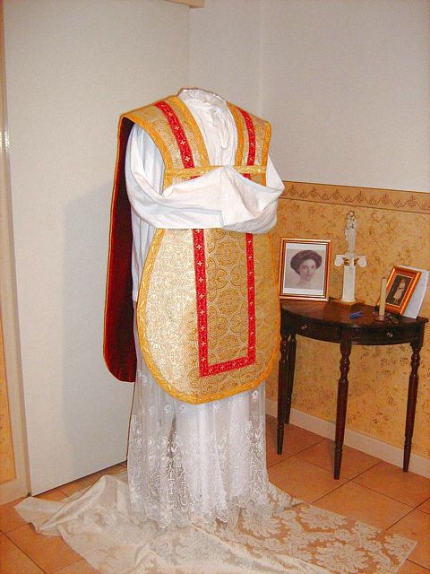 Solemn High Mass Vestments in real metal fabric, extensively trimmed, lined in pure silk.